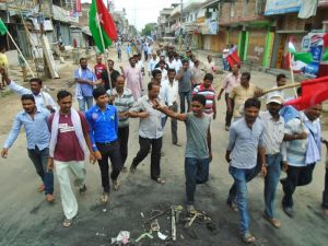 Caders of Madhesi Morcha forcing to shut down market areas in Rajbiraj, on the first day of  two day general strike on Sunday, August 16, 2015.  Photo: Byas Shankar Upadhyaya