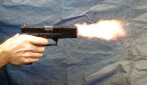 tv armourer firing pistol